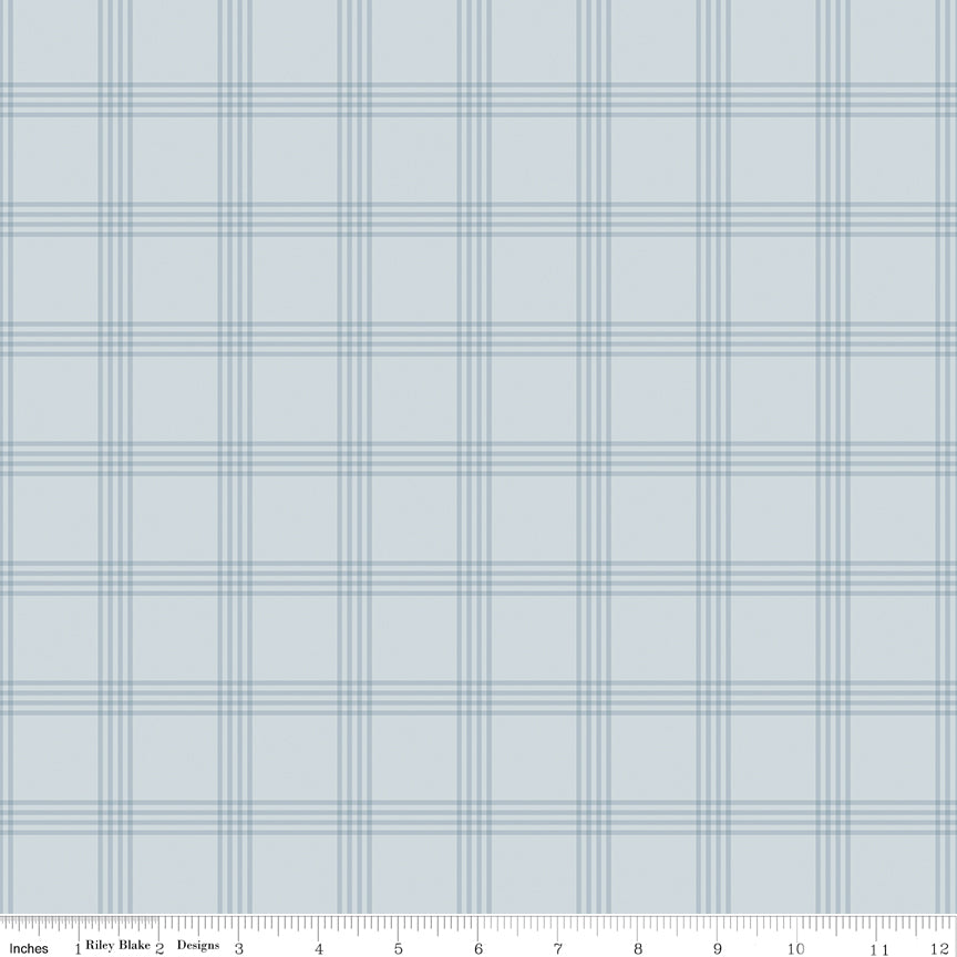 Plaid pattern fabric swatch on a light blue background