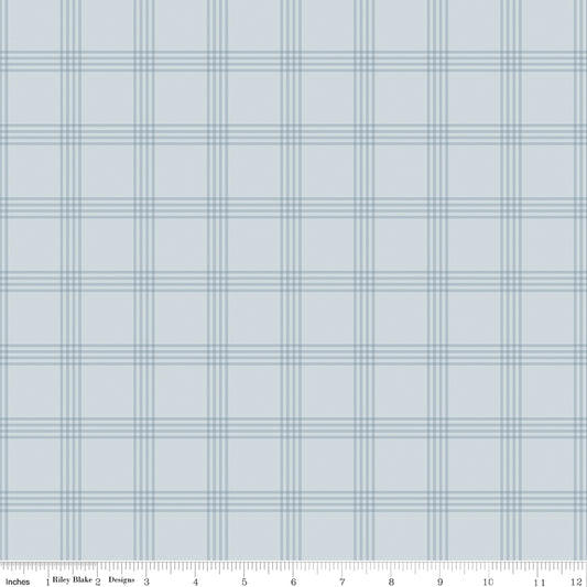 Plaid pattern fabric swatch on a light blue background