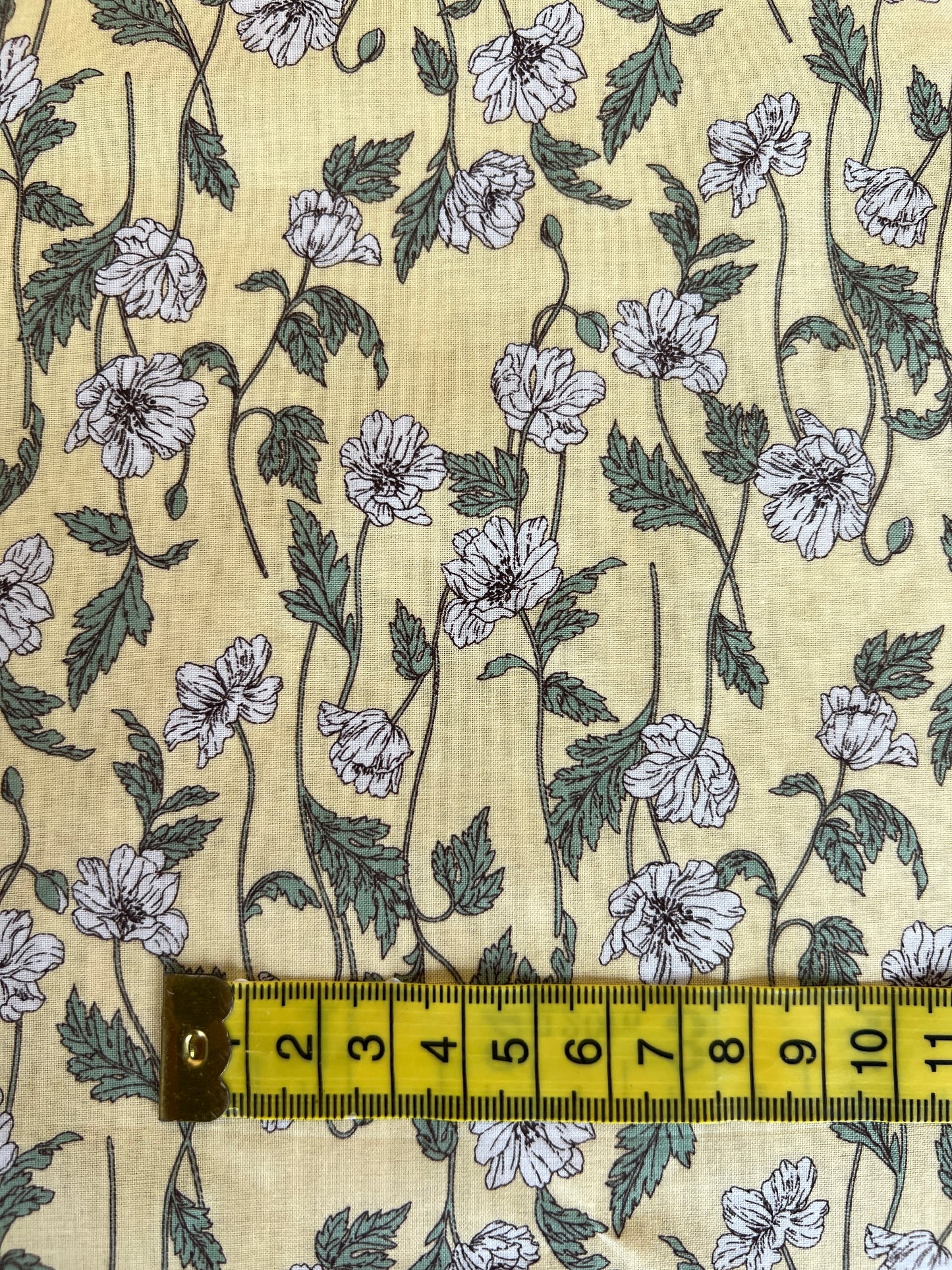 White Flower on Yellow Lawn Fabric by Hokkoh (sold in 25cm increments)