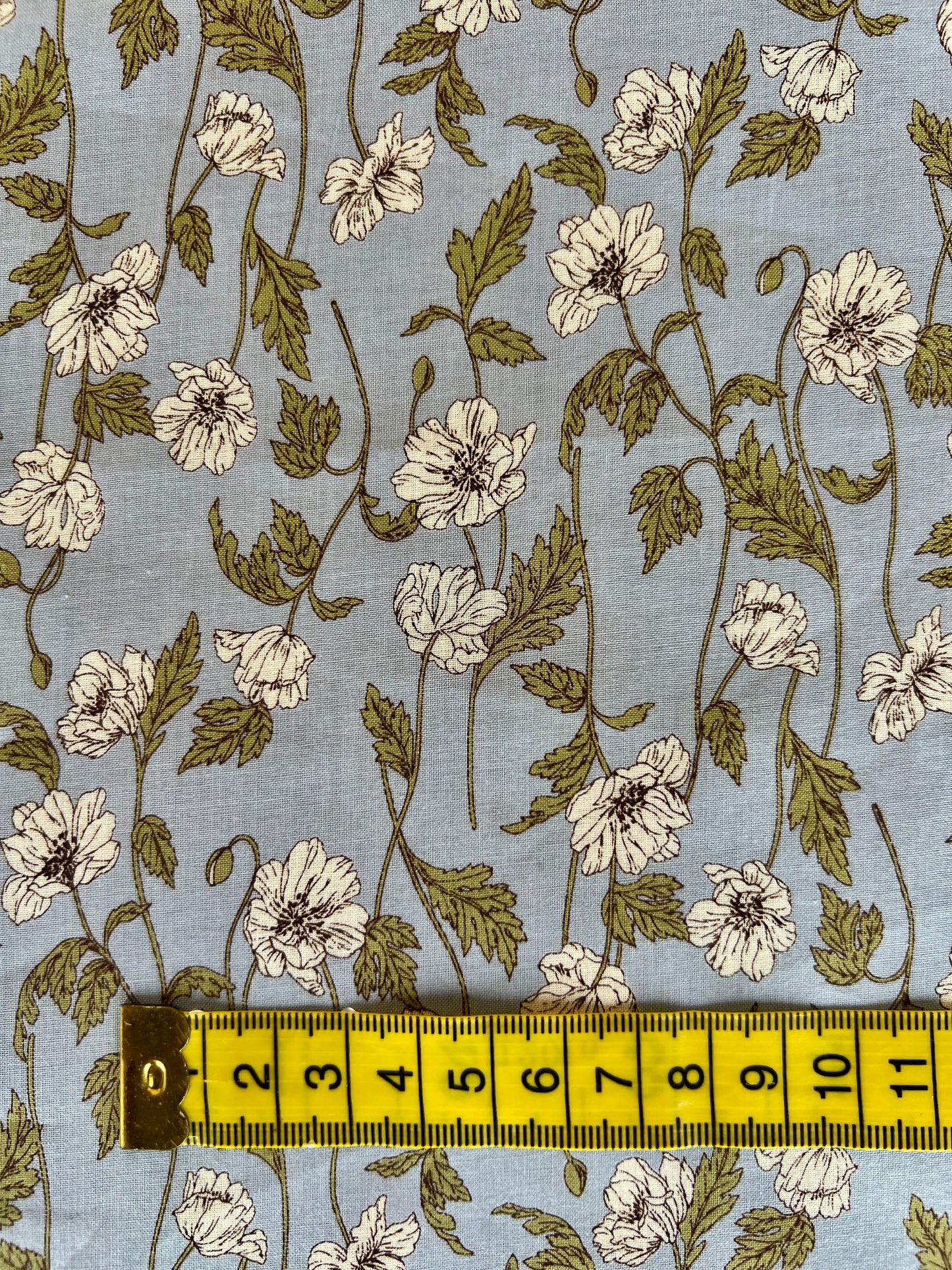 White Flower on Blue Lawn Fabric by Hokkoh (sold in 25cm increments)