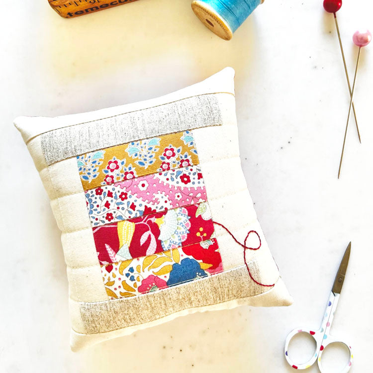 Cotton Reel Pincushion by Tied with a Ribbon