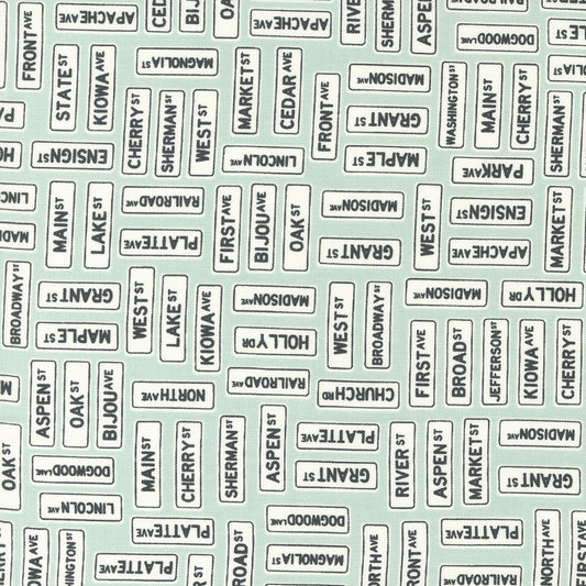 Main Street Street Signs Sky M5564322 by Sweetwater for Moda Fabrics (sold in 25cm increments)
