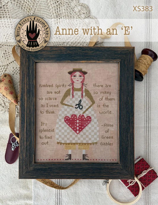 Anne with an E Cross Stitch pattern by Teresa Kogut