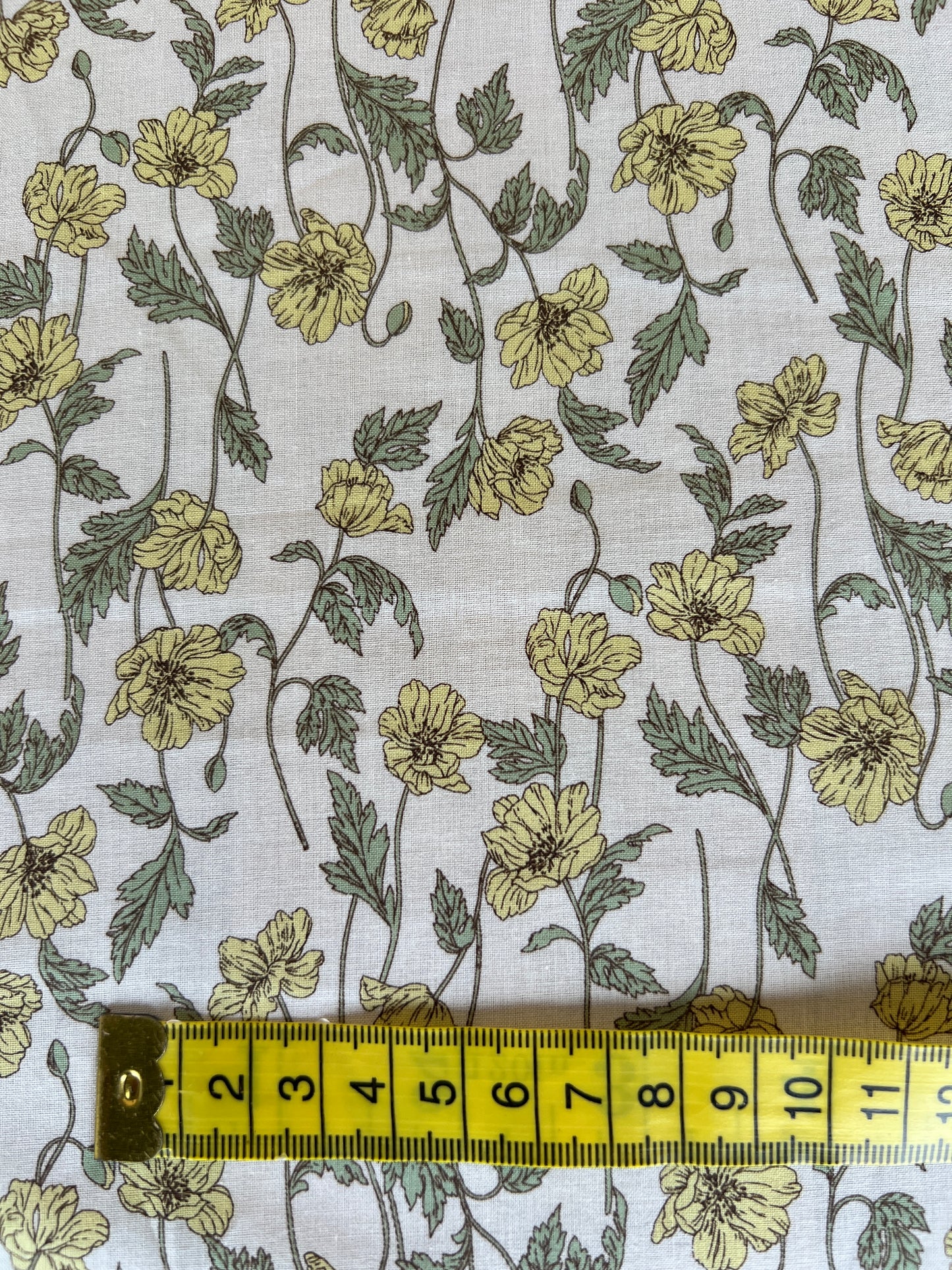 Yellow Flower on White Lawn Fabric by Hokkoh (sold in 25cm increments)