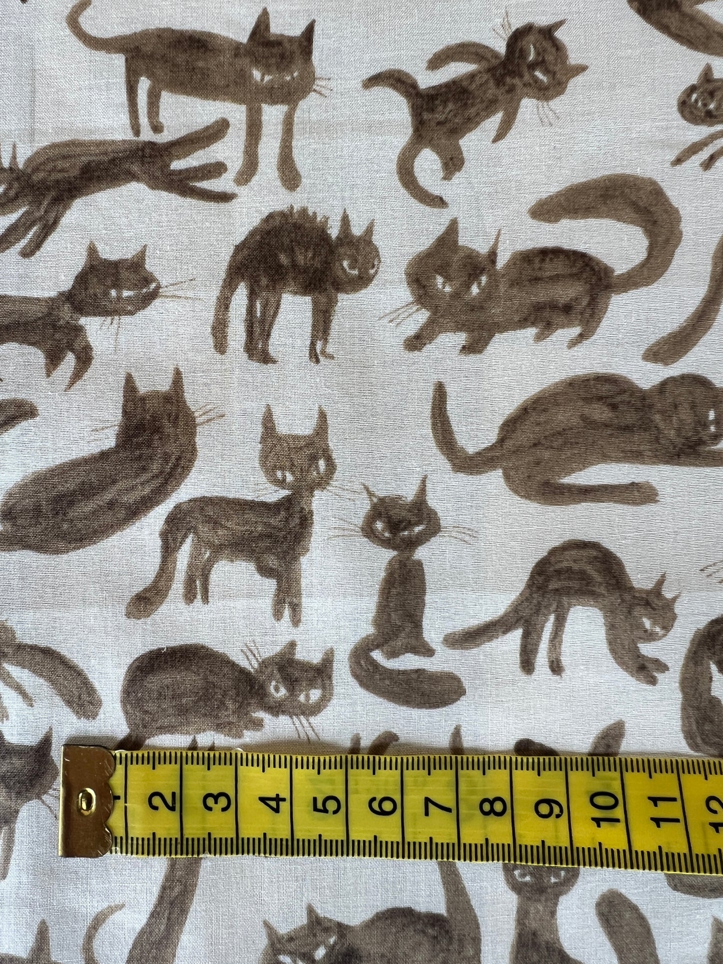 Cats Brown on White Lawn Fabric by Hokkoh (sold in 25cm increments)