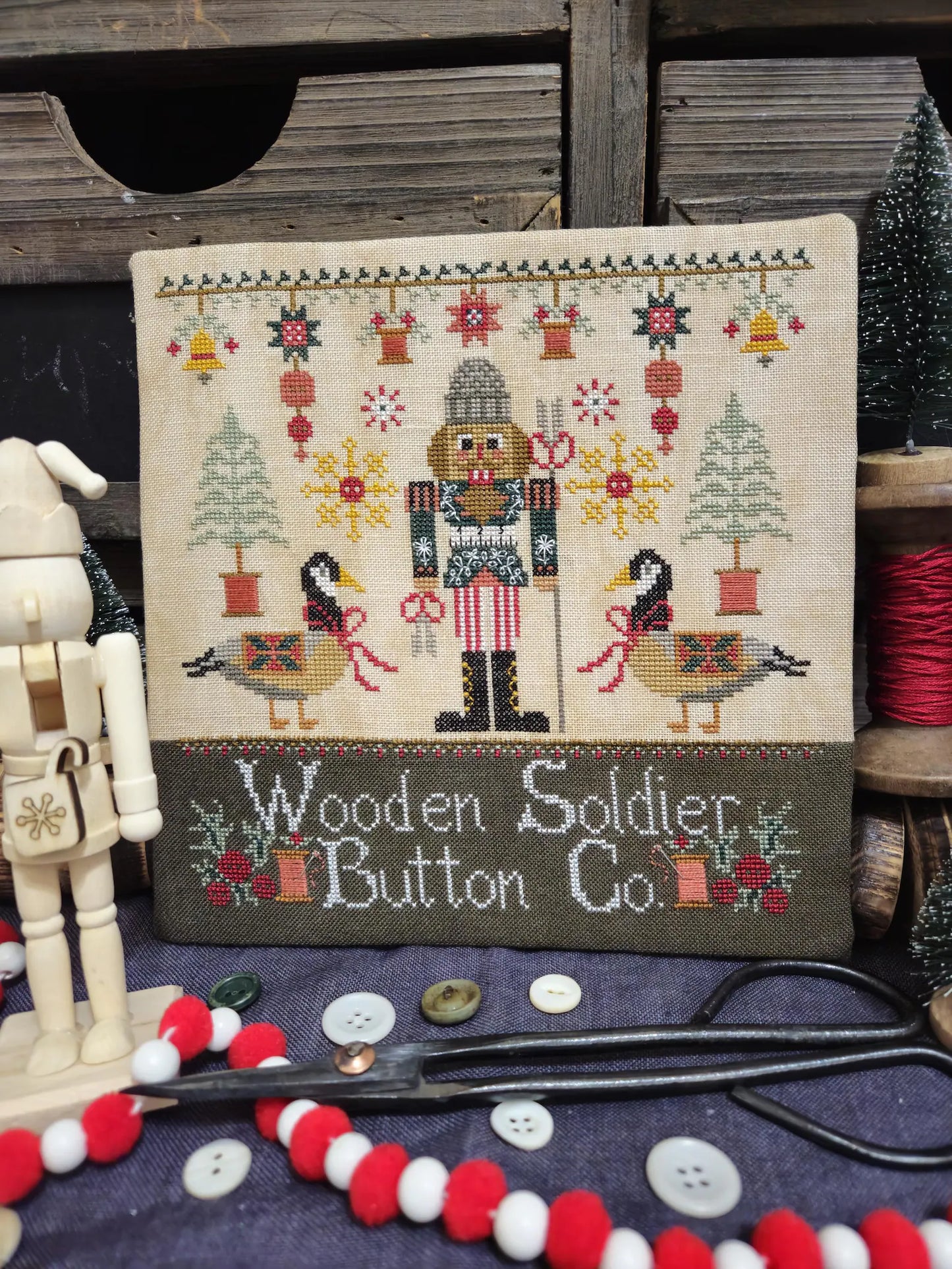 Wooden Soldier Button Co. Cross Stitch Pattern by Quaint Rose Needlearts.